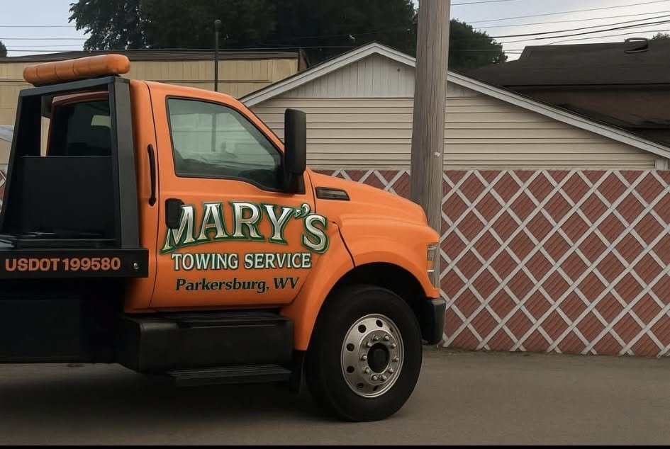 Mary's Towing Service flatbed tow truck — Parkersburg, WV. USDOT 199580.